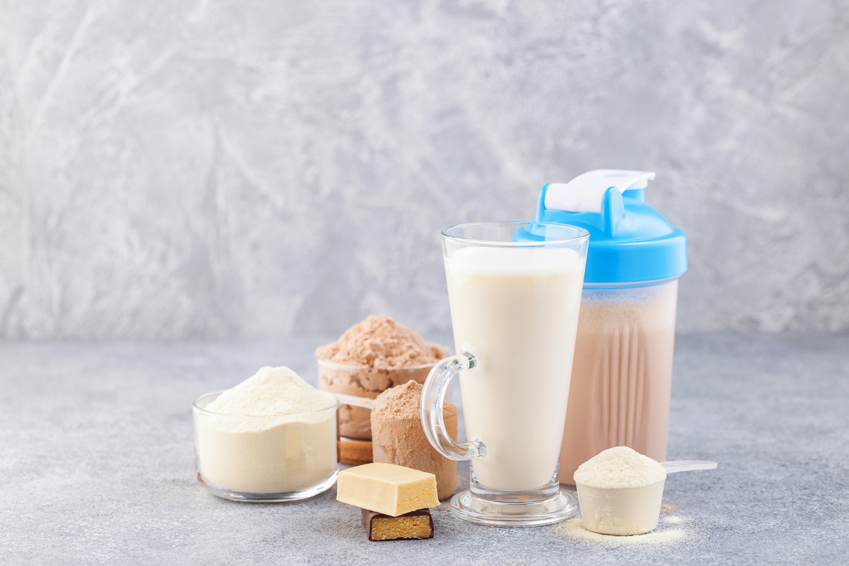 Protein shake bottle, powder and bars